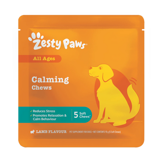 Zesty Paws Calming Chews pet supplement pouch for dogs, featuring a bright orange background with a yellow dog illustration and a teal banner highlighting benefits.